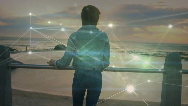 Woman lifting smartphone making call and activating tech network overlay while scanning horizon