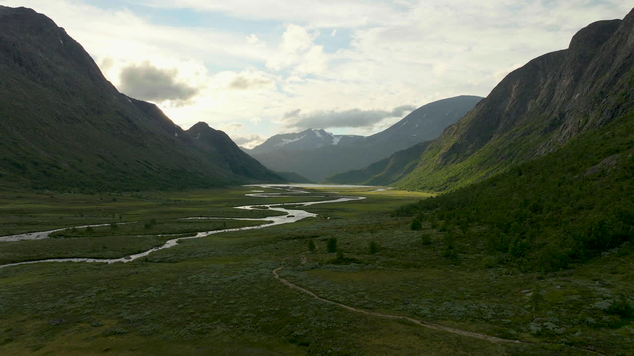 Aerial in picturesque valley with imposing mountainous landscape, epic nature scene - Jotunheimen National Park