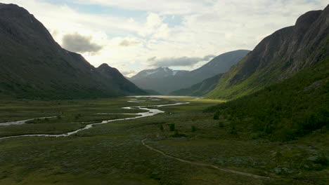 aerial in picturesque valley with imposing mountainous landscape, epic nature scene - jotunheimen national park