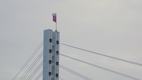 russian flag on a cable-stayed bridge