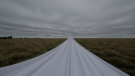 white drape across a field
