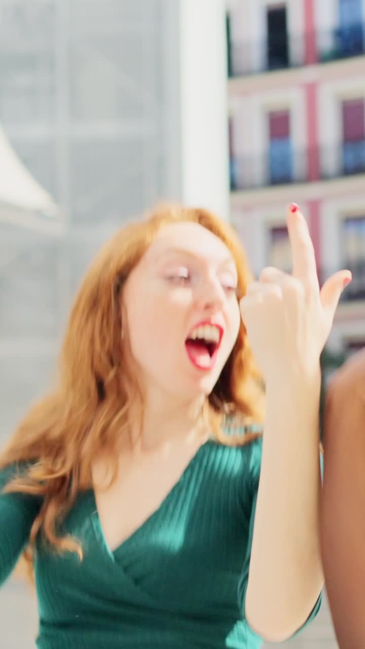 Joyful Women Laughing and Having Fun Outdoors