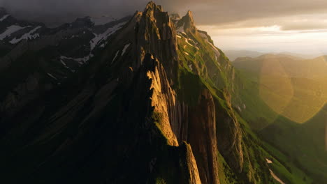 Ridge-Of-The-Majestic-Schafler-Peak-In-Switzerland-At-Sunset---Aerial-Drone-Shot