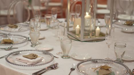 round wedding table decorated with fresh flowers