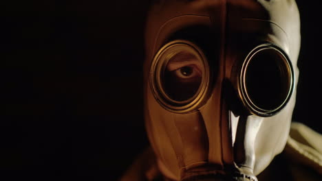 The-Gleams-Of-The-Fire-Are-Reflected-In-The-Eye-And-Gas-Mask-Of-The-Man