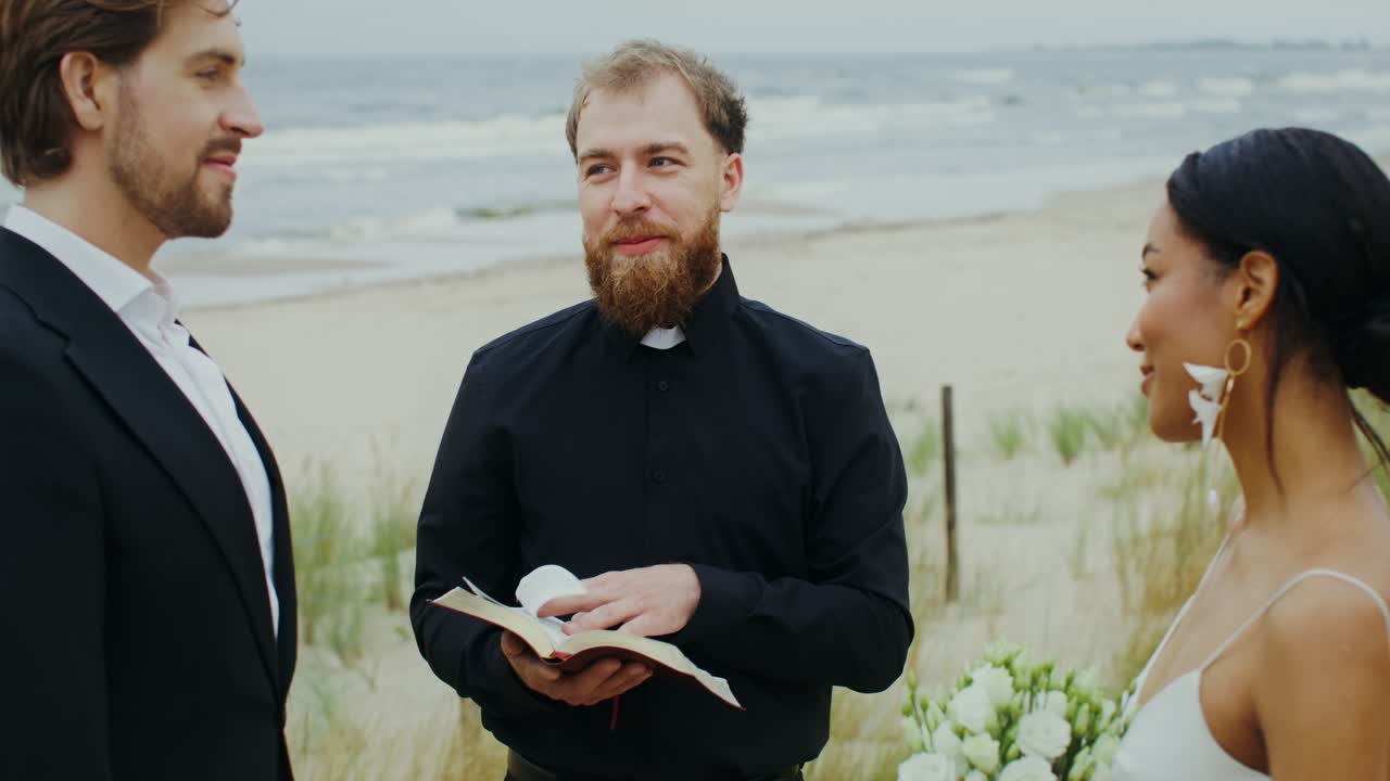 Beach Wedding Ceremony with Interracial Couple