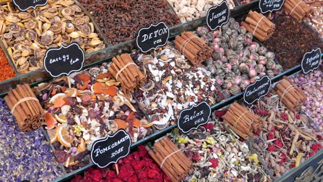 closeup of loose leaf tea blends displayed at a shop