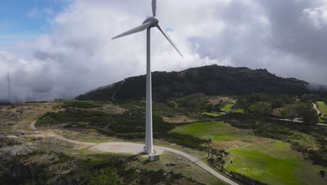 wind turbine for eolic energy production on green mountain of caramulo, portugal