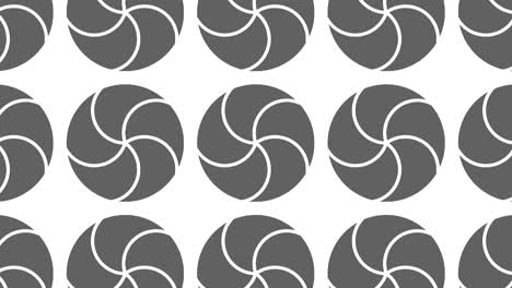 patrón gráfico en blanco y negro con efecto estroboscópico e hipnótico, mientras aumenta en tamaño y luego lo reduce.
