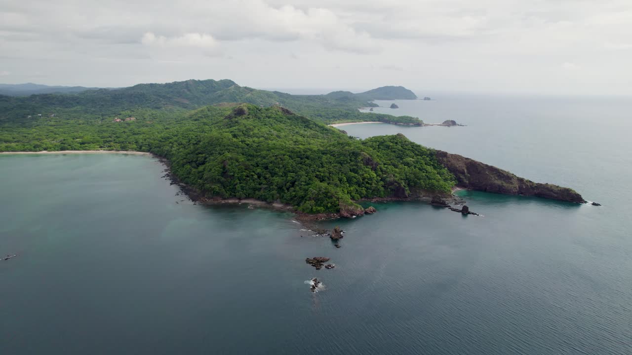 A 4K drone shot of Punta Sabana Point and the Mirador Conchal Peninsula next to Puerto Viejo and Playa Conchal, or &ldquo;Shell Beach&rdquo;, along the north-western coast of Costa Rica