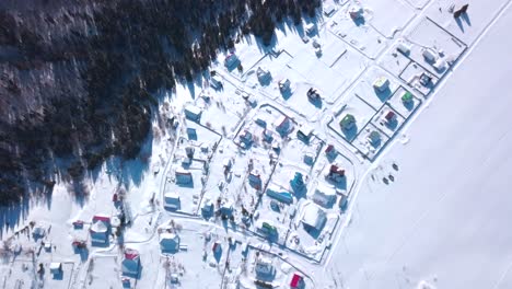 aerial view of a snowy mountain village