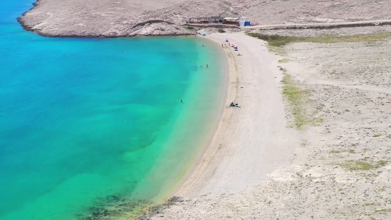 paradisíaca playa de arena blanca con aguas turquesas, isla de pag