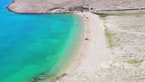 Paradisíaca-Playa-De-Arena-Blanca-Con-Aguas-Turquesas,-Isla-De-Pag