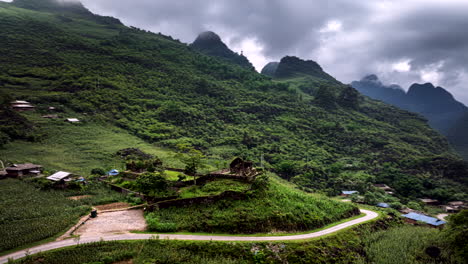 Adventurous Ha Giang Loop past French Military Post in valley, drone hyperlapse