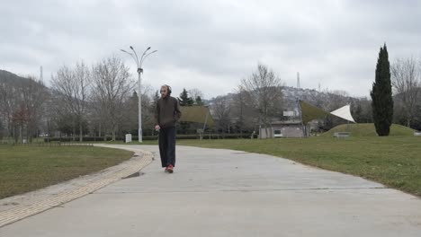 man strolling on park