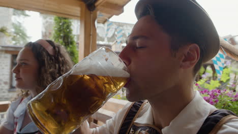 people in traditional clothing drinking beer