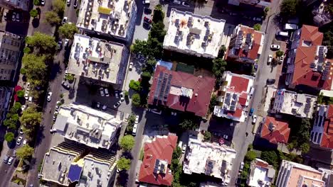 aerial view of a residential area with apartment buildings and solar panels