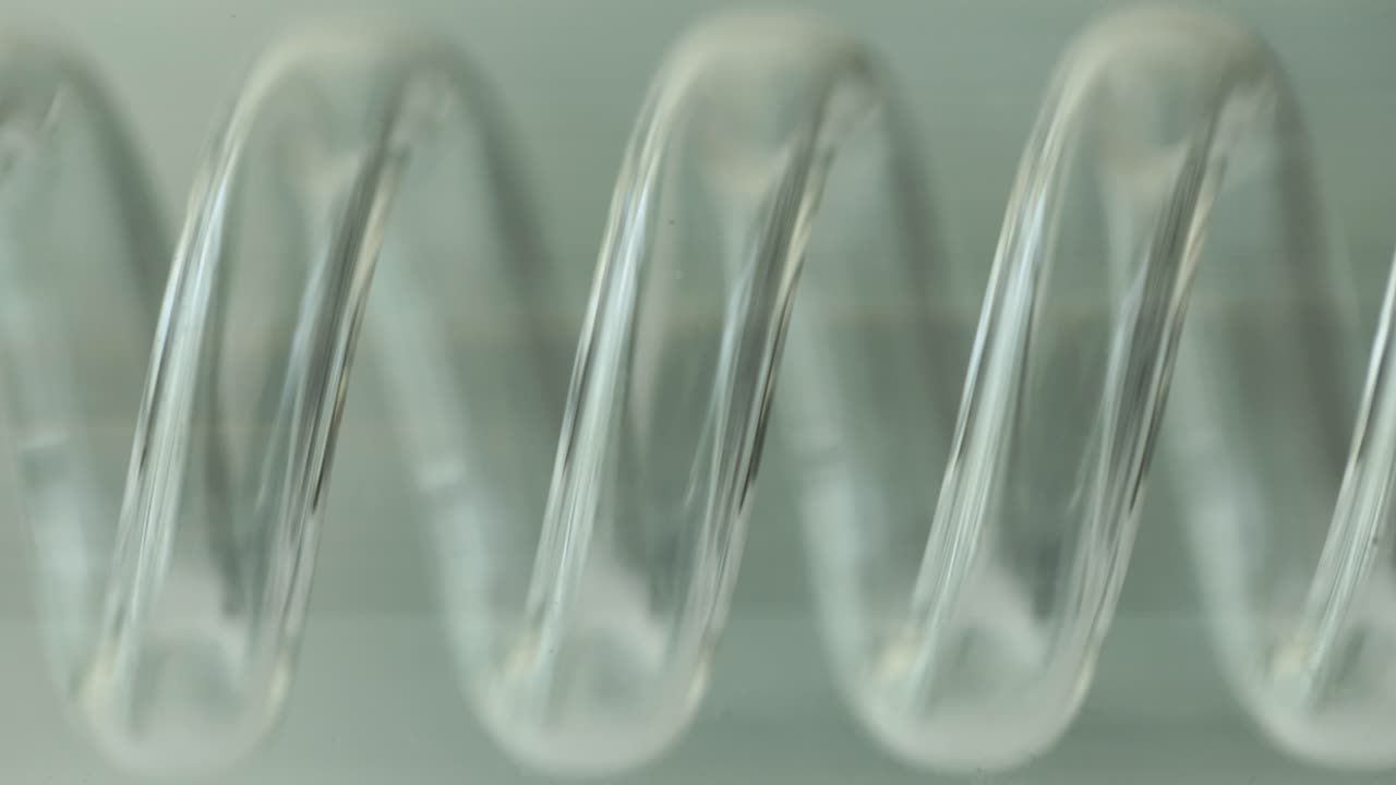 Close-up of a clear glass spiral tube