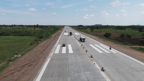 a cinematic aerial video captures a highway with the sight of an emergency landing runway constructed on nh 16 at pichukalagudipadu village in the korisapadu area of the chennai-vijayawada expressway