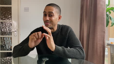 young man on a video call telling story to his friends directly to camera