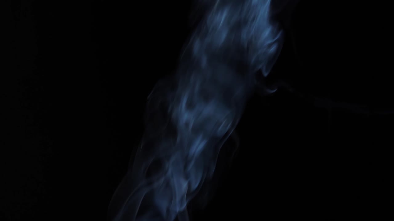 Vapor Steam Rising Over Black Background