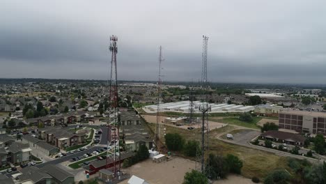 radio towers shot by drone during an ominous cloudy storm