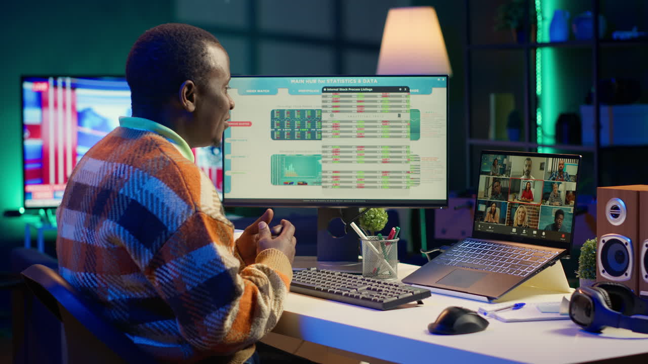 Man working from home on computer with video call