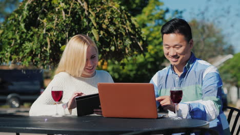 couple drinking and smoking using technology