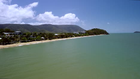 Aerial-Along-Trinity-Beach-Coastline-With-MacAlister-Range-In-The-Background