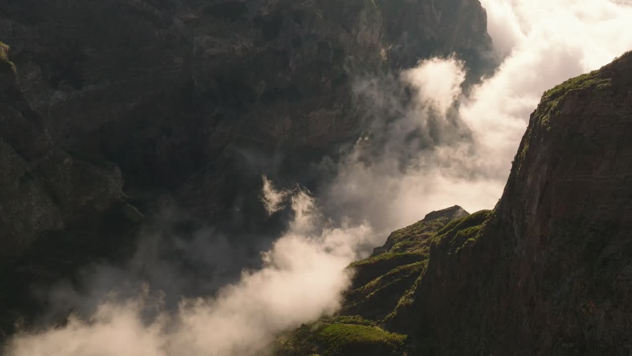 Drone flight over the cloudy mountains in Madeira Portugal