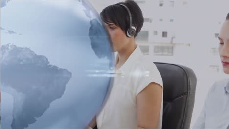 animation of globe over business people wearing headsets