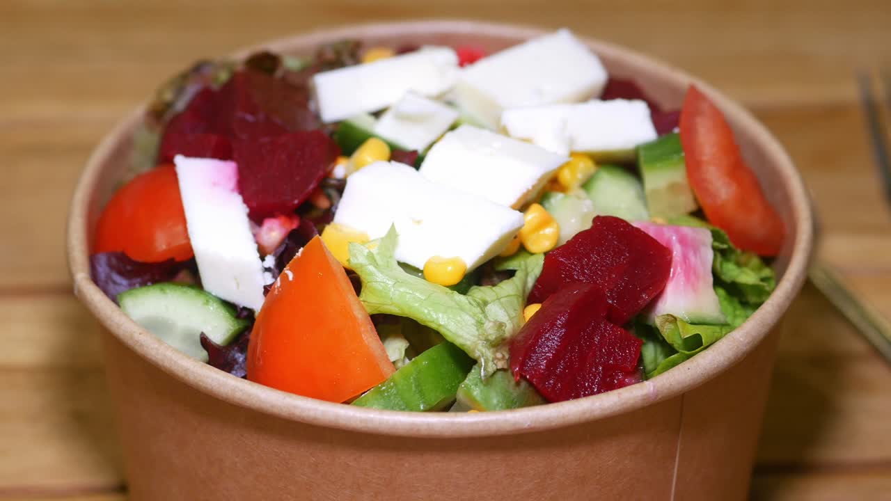 Mixed Vegetable Salad in a Paper Bowl