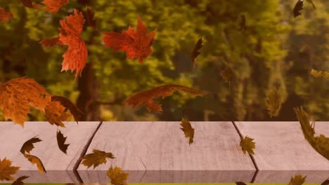 Digital-animation-of-multiple-autumn-leaves-floating-over-wooden-surface-against-forest