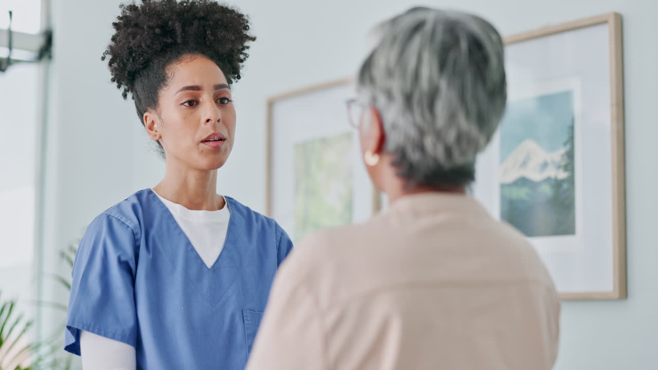 Nurse Discussing with Patient