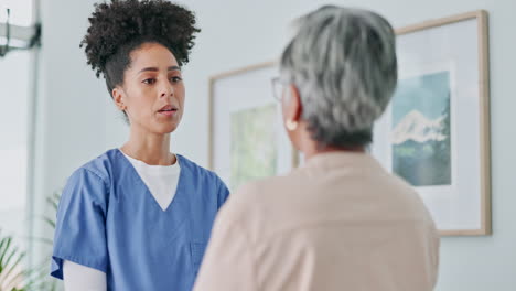 nurse discussing with patient