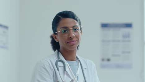 portrait of young african-american female doctor in clinic
