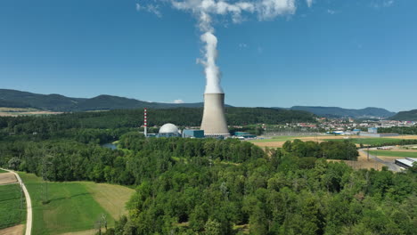 Nuclear-power-plant-Gösgen-Switzerland-on-sunny-afternoon,-drone-pedestal-shot