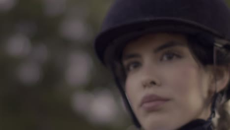 Smiling-happy-woman-in-closeup,-jockey-before-the-horse-race