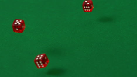 red dice falling and bouncing