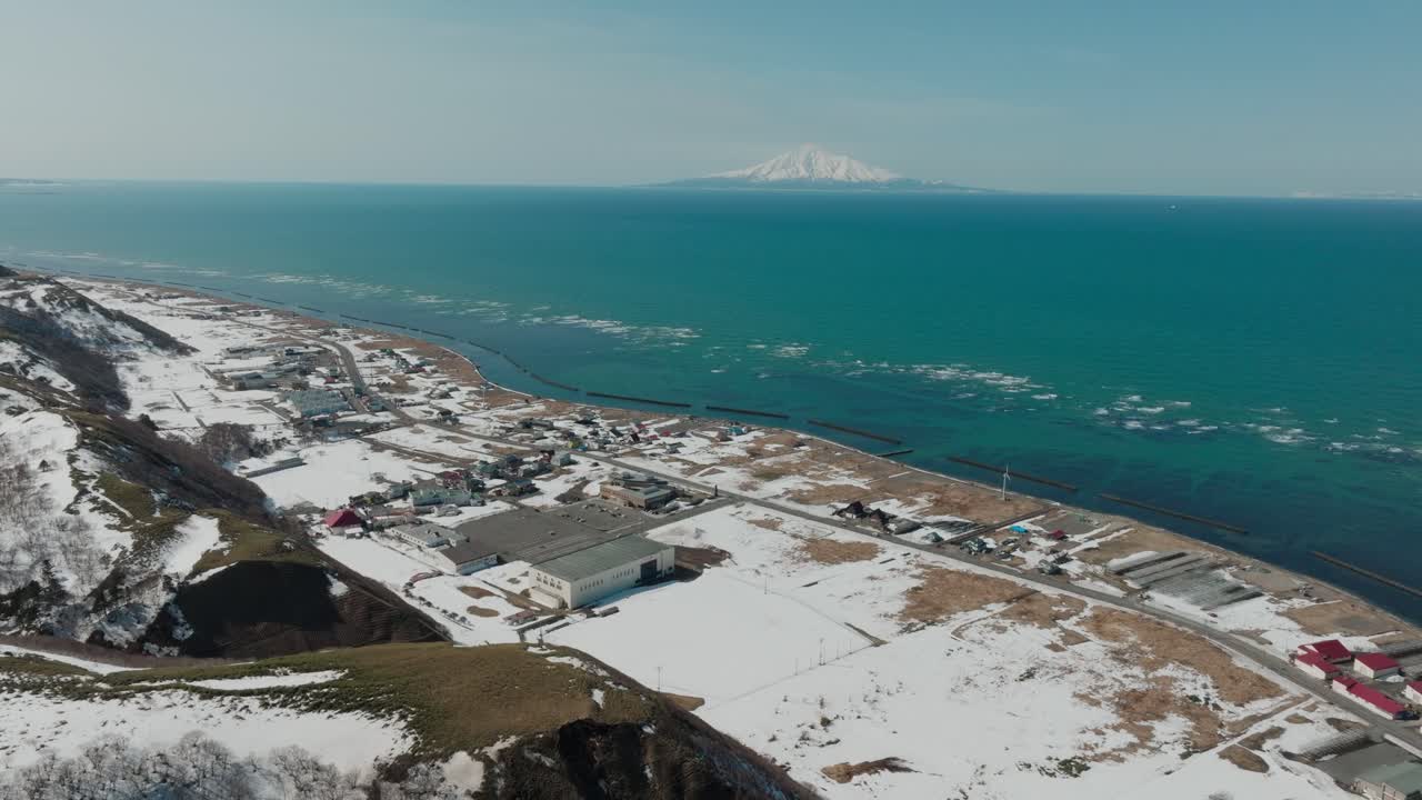 Snowy Mount Rishiri by The Sea of Japan From Wakkanai In Winter In Hokkaido, Japan. - aerial shot
