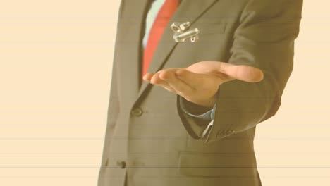 animation of businessman throwing and catching nuts and bolt, on pale orange background