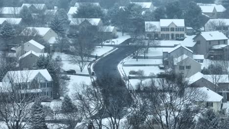 Blizzard-over-American-neighborhood-with-large-houses