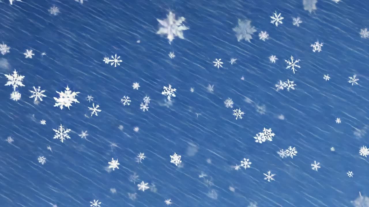 파란색 배경에 떨어지는 눈송이