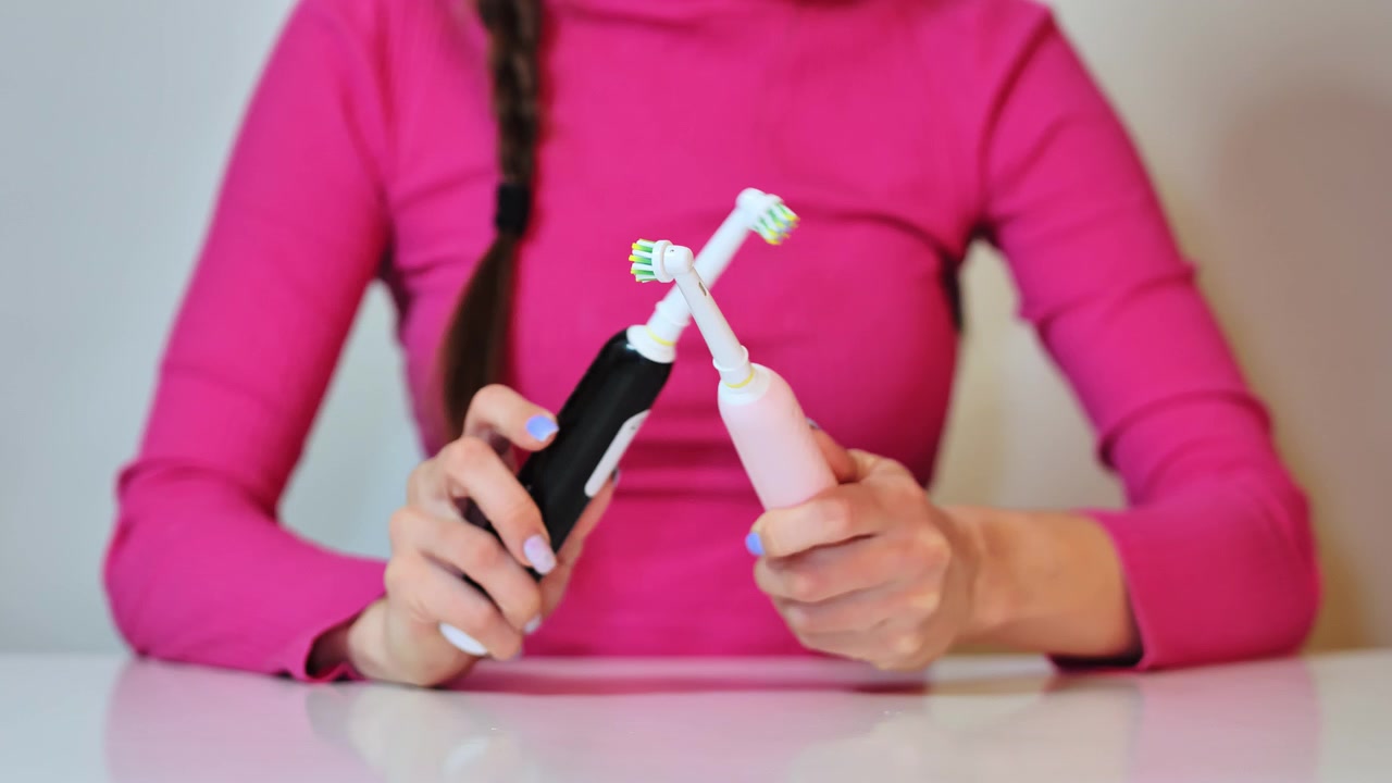 Gentle hand movements present modern dental devices for healthy hygiene habits