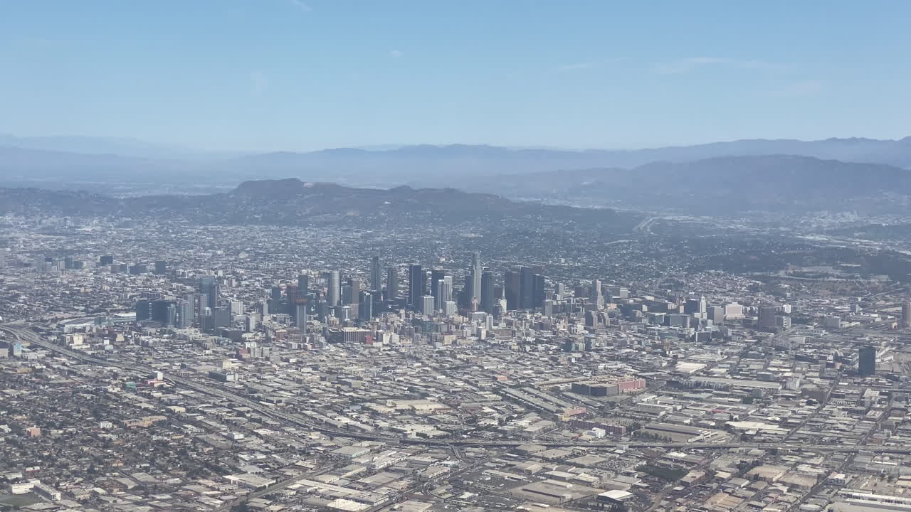 An aerial view of the Los Angeles downtown core looking north with Burbank in the distance