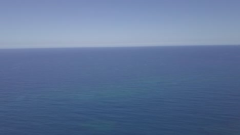big blue ocean horizon atlantic or pacific aerial 4k