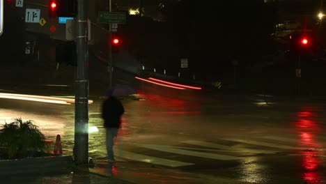 intersection time lapse in los angeles on a rainy night