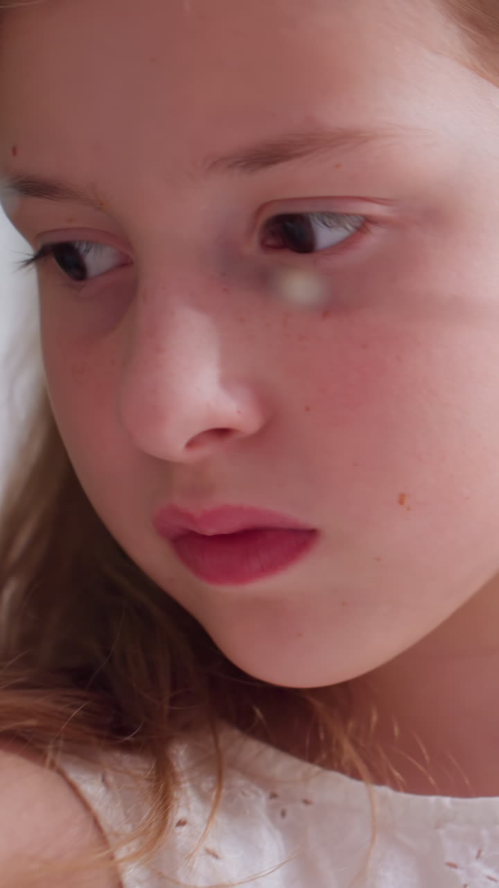 Women with tense expressions and shifting eyes, Indoor portrait capturing girl with nervousness and concern, Candid scene of young woman exhibiting anxious emotions and uncertain breathing