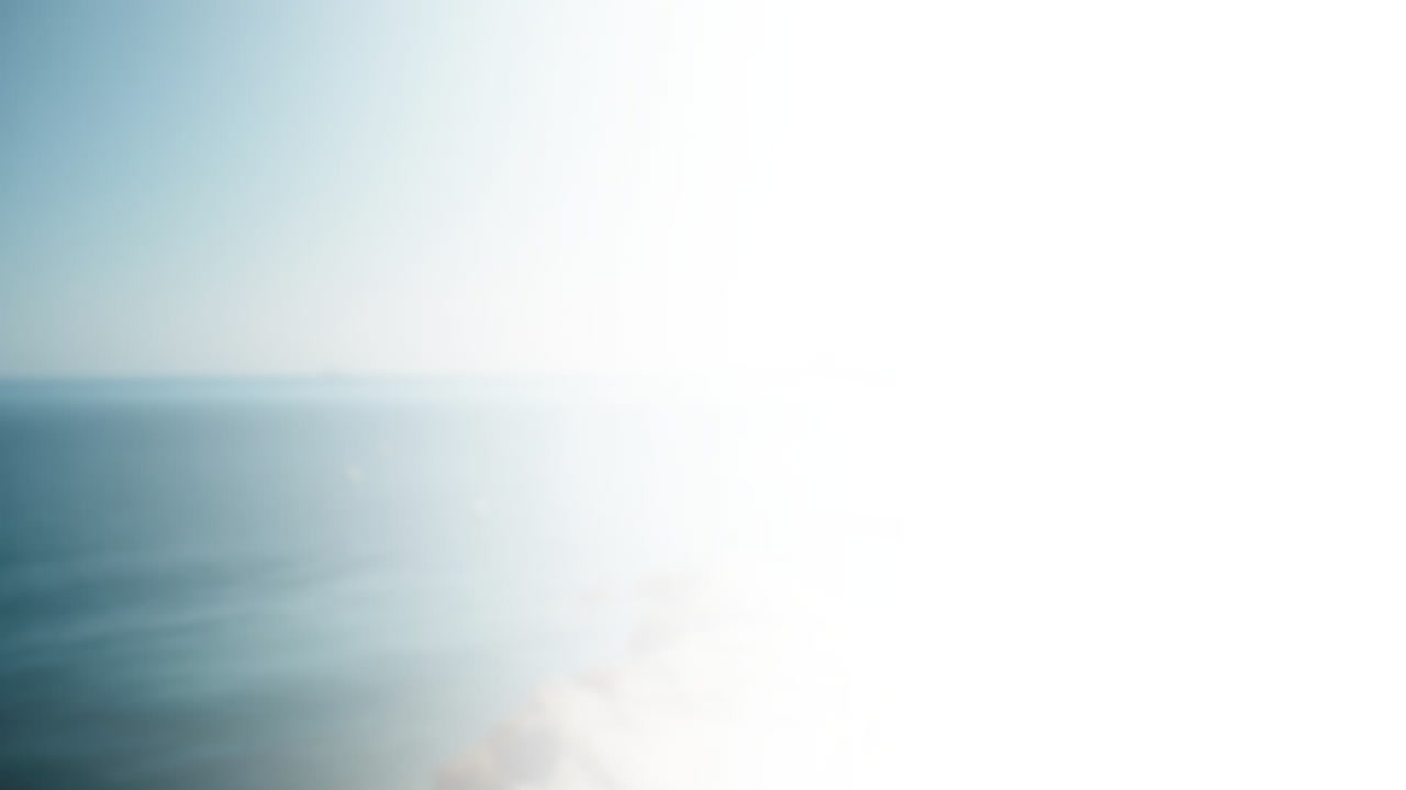 Ocean waves crashing on beach, animation of bright sunlight reflecting on water