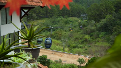 Gondola-Cabins-Arriving-and-Departing-From-Da-Lat-Cable-Car-Station-Near-Truc-Lam-Monastery